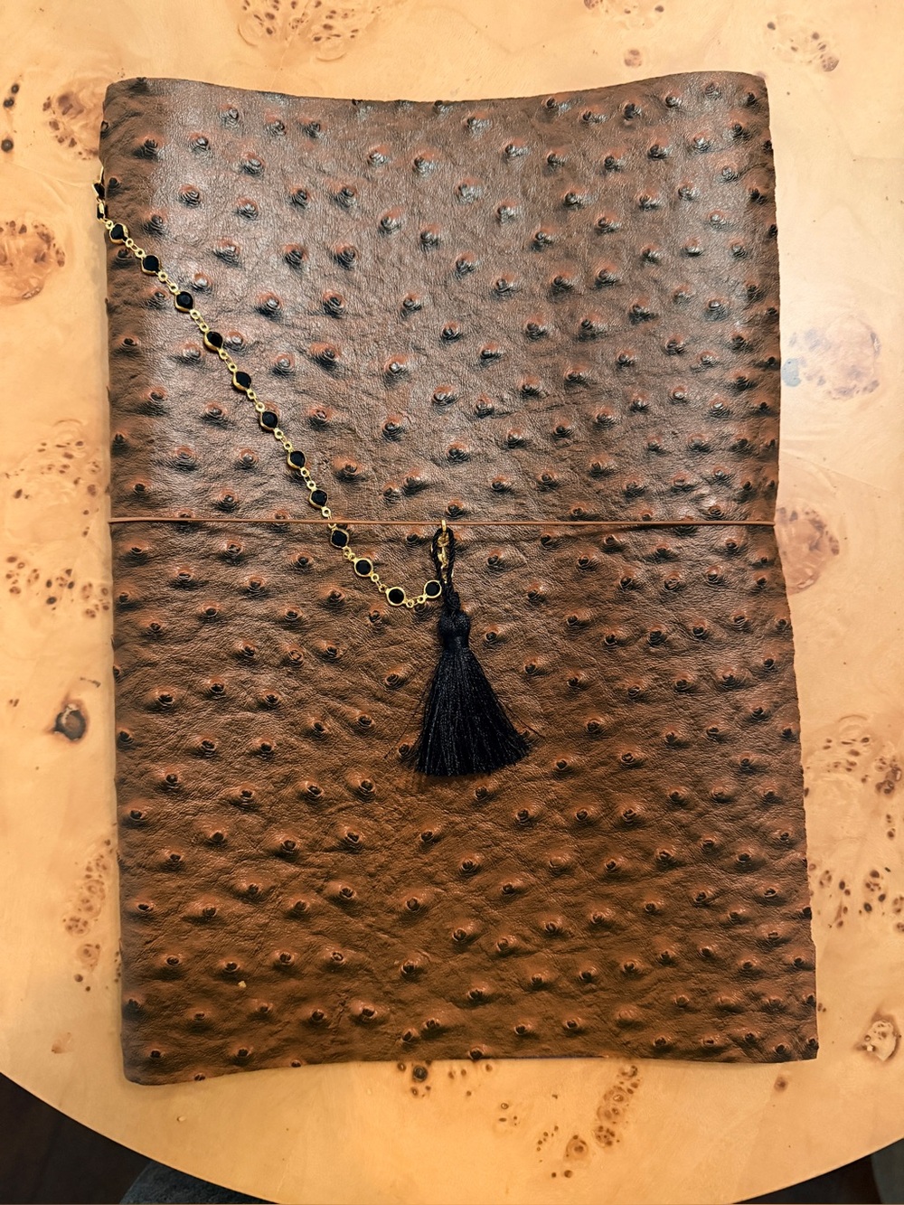 A4 Brown Faux Ostrich Leather Journal with black tassel.
